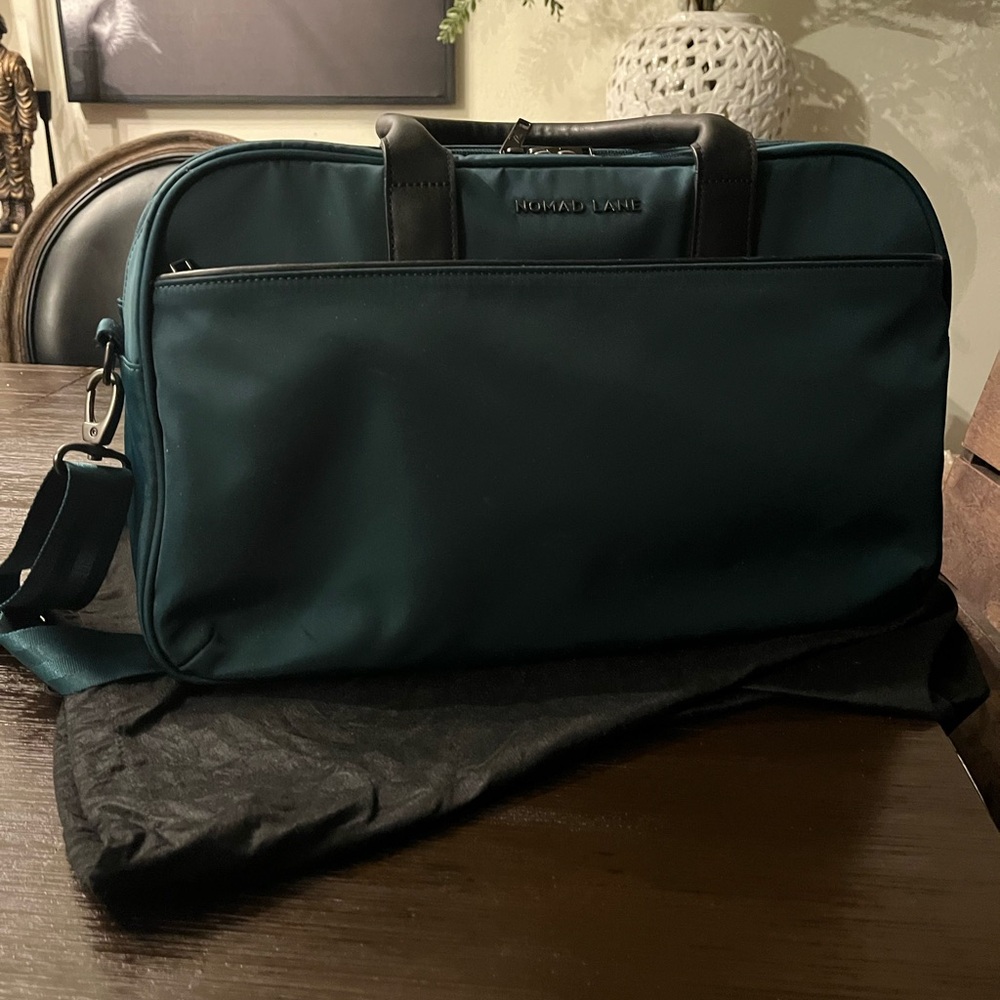 Pine color personal size travel bag.